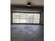 Garage interior with door view of the home exterior at 11696 Sw 71St Cir, Ocala, FL 34476