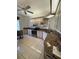 Kitchen features white cabinets, granite countertops, and stainless steel appliances at 11696 Sw 71St Cir, Ocala, FL 34476
