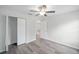 Bedroom with a ceiling fan and a double door closet at 24381 Nw Falcon Ave, Dunnellon, FL 34432