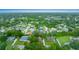 High angle aerial view of a densely populated suburban neighborhood with homes and trees at 2818 Se 24Th Ave, Ocala, FL 34471