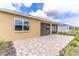 Spacious backyard with a brick patio, perfect for outdoor entertaining at 9994 Sw 96Th St, Ocala, FL 34481