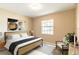 Comfortable bedroom featuring a plush bed, natural lighting, and stylish decor at 9994 Sw 96Th St, Ocala, FL 34481