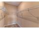 Walk-in closet featuring wire shelving and modern flooring for ample storage at 9994 Sw 96Th St, Ocala, FL 34481