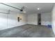 Spacious two car garage with clean white walls and concrete flooring at 9994 Sw 96Th St, Ocala, FL 34481