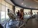 Gym with treadmills and large windows at 9994 Sw 96Th St, Ocala, FL 34481