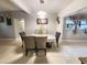 Dining area with gray walls and a chandelier at 1147 Northcrest Dr, Apopka, FL 32703