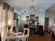 Dining room with table, chairs, and chandelier at 147 Juniper Run, Ocala, FL 34480