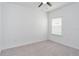 Empty bedroom with gray carpet and large window at 7531 Sw 77Th Ave, Ocala, FL 34481