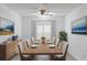 Bright dining room with wood table and seating for six at 7531 Sw 77Th Ave, Ocala, FL 34481