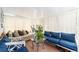 Relaxing Florida room filled with natural light, comfortable seating, and lush plants at 10978 Sw 83Rd Ave, Ocala, FL 34481