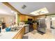 Bright kitchen with stainless steel appliances, plenty of counter space, and open layout at 10978 Sw 83Rd Ave, Ocala, FL 34481
