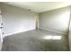 Bedroom with light gray wood-look tile flooring, neutral paint, and ample natural light at 13374 Sw 63Rd Ter, Ocala, FL 34473