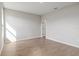 Light filled bedroom with light gray walls and light wood look floors at 13374 Sw 63Rd Ter, Ocala, FL 34473