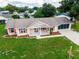 Single story house with a large yard and two car garage at 8981 Sw 116Th Place Rd, Ocala, FL 34481