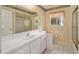 Updated bathroom with walk-in shower and tiled floor at 2398 Nw 50Th Ave, Ocala, FL 34482