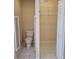 Small bathroom with toilet and closet at 2398 Nw 50Th Ave, Ocala, FL 34482