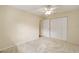 Spacious bedroom with double door closet and carpet at 2398 Nw 50Th Ave, Ocala, FL 34482