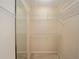 Large walk-in closet with wire shelving for convenient storage at 2398 Nw 50Th Ave, Ocala, FL 34482