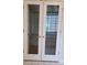 White double doors with glass panes leading to another room at 2398 Nw 50Th Ave, Ocala, FL 34482