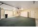 Spacious garage with carpeting and ample storage at 2398 Nw 50Th Ave, Ocala, FL 34482