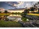 Scenic golf course with pond at sunset at 2398 Nw 50Th Ave, Ocala, FL 34482