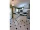 Kitchen with an island, stainless steel appliances, and a black countertop at 2398 Nw 50Th Ave, Ocala, FL 34482