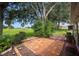 Spacious patio with terracotta tile and golf course views at 2398 Nw 50Th Ave, Ocala, FL 34482