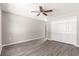 A bedroom view featuring a closet and a ceiling fan, offering a comfortable space at 4030 Se 134Th St, Belleview, FL 34420