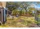 Spacious backyard with trees and lawn at 6990 Se 122Nd Ln, Belleview, FL 34420