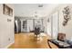 Cozy dining area with light wood floors and a modern dining set at 6990 Se 122Nd Ln, Belleview, FL 34420