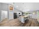 Spacious kitchen featuring a large granite island and stainless steel appliances at 1934 Nw 79Th Loop, Ocala, FL 34475