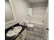 Well-lit bathroom includes a single vanity, toilet, and shower-tub combination at 3174 Sw 189Th Ave, Dunnellon, FL 34432