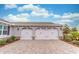 Two-car garage with paver driveway at 9124 Sw 84Th Ln, Ocala, FL 34481