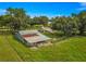Aerial view showing the house, barn and large lot at 1000 Se 155Th St, Summerfield, FL 34491
