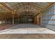 Open barn interior offering ample storage space at 1000 Se 155Th St, Summerfield, FL 34491