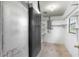 Unfinished basement with shelving and window at 1000 Se 155Th St, Summerfield, FL 34491