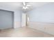 Light blue bedroom with patterned border and closet at 1000 Se 155Th St, Summerfield, FL 34491