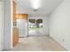 Kitchen with sliding glass doors leading to the patio at 1000 Se 155Th St, Summerfield, FL 34491