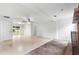 Spacious living room features a fireplace and access to the backyard at 1000 Se 155Th St, Summerfield, FL 34491