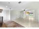 Open living space with views into kitchen and backyard at 1000 Se 155Th St, Summerfield, FL 34491