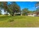 Property boasts a large barn and expansive grassy yard at 1000 Se 155Th St, Summerfield, FL 34491