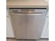 Stainless steel dishwasher in a white kitchen at 11680 Sw 140Th Loop, Dunnellon, FL 34432