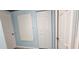 The hallway features multiple doors and an access panel at 17808 Se 115Th Ct, Summerfield, FL 34491