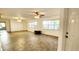 Bright living room with tile floors, ceiling fans and many windows that provide natural light at 17808 Se 115Th Ct, Summerfield, FL 34491