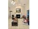 Spacious living room with fireplace and view of playroom at 5650 Se 34Th St, Ocala, FL 34480