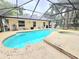 Screened in pool with spa and backyard view at 5650 Se 34Th St, Ocala, FL 34480