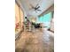 Relaxing screened porch with tile floor and seating area at 5650 Se 34Th St, Ocala, FL 34480