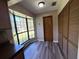 The breakfast nook has built-in storage and plenty of natural light at 5877 Nw 64Th St, Ocala, FL 34482