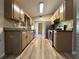 The kitchen features modern appliances, plenty of natural light, and ample counter space at 5877 Nw 64Th St, Ocala, FL 34482