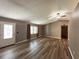 Bright living room with wood floors, natural light and an open concept at 5877 Nw 64Th St, Ocala, FL 34482